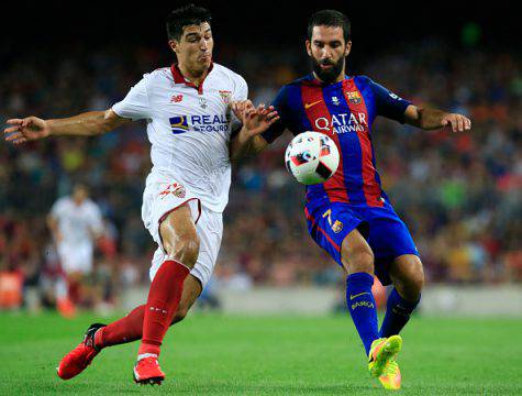 Diego Glez e Arda Turan (©Getty Images)