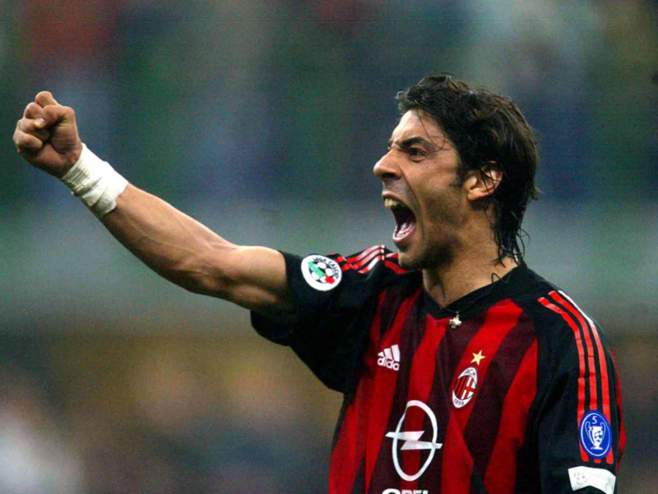  Rui Costa celebrates a goal while playing for AC Milan during a Serie A match.